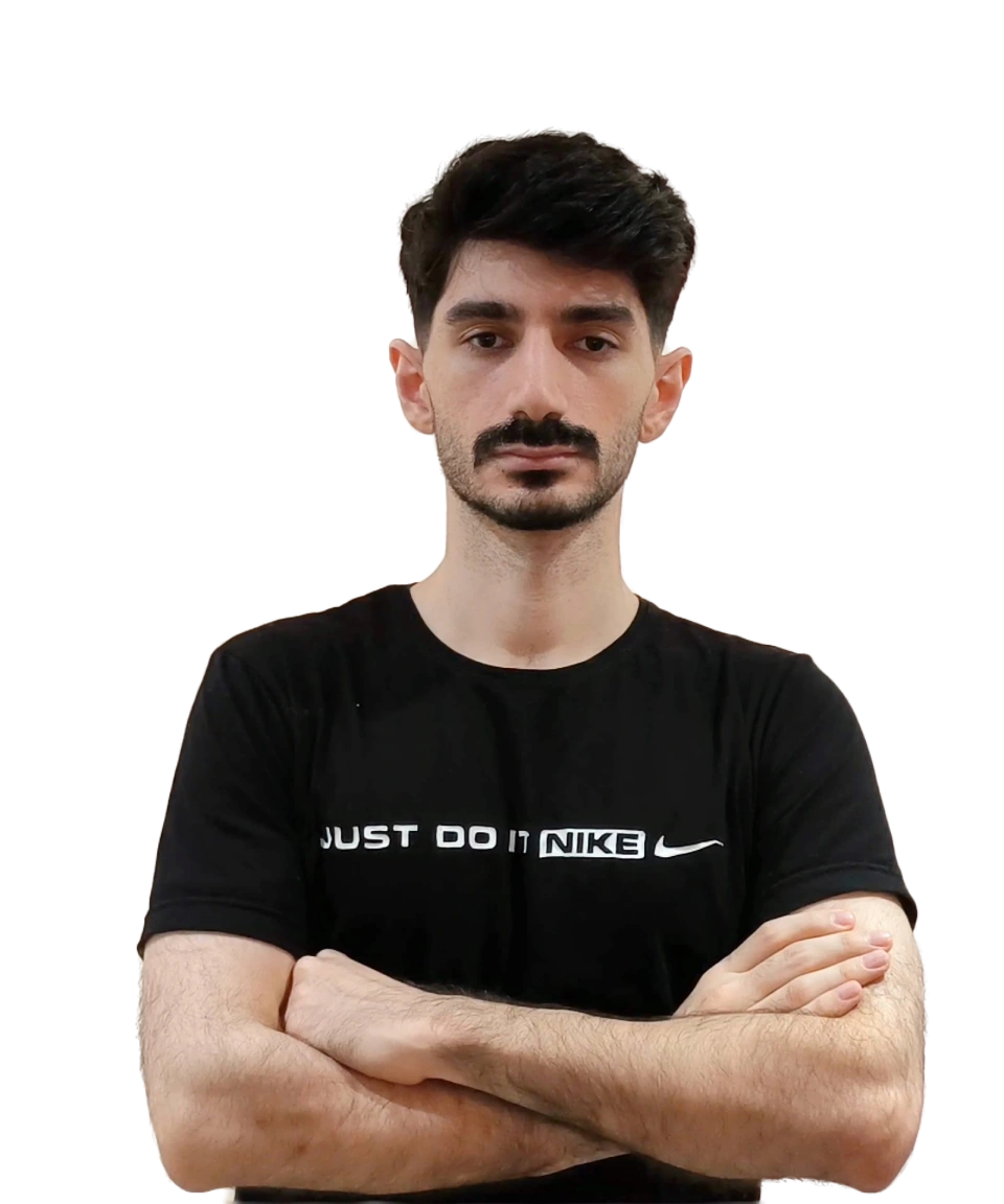 Hayyaun standing with his arms folded